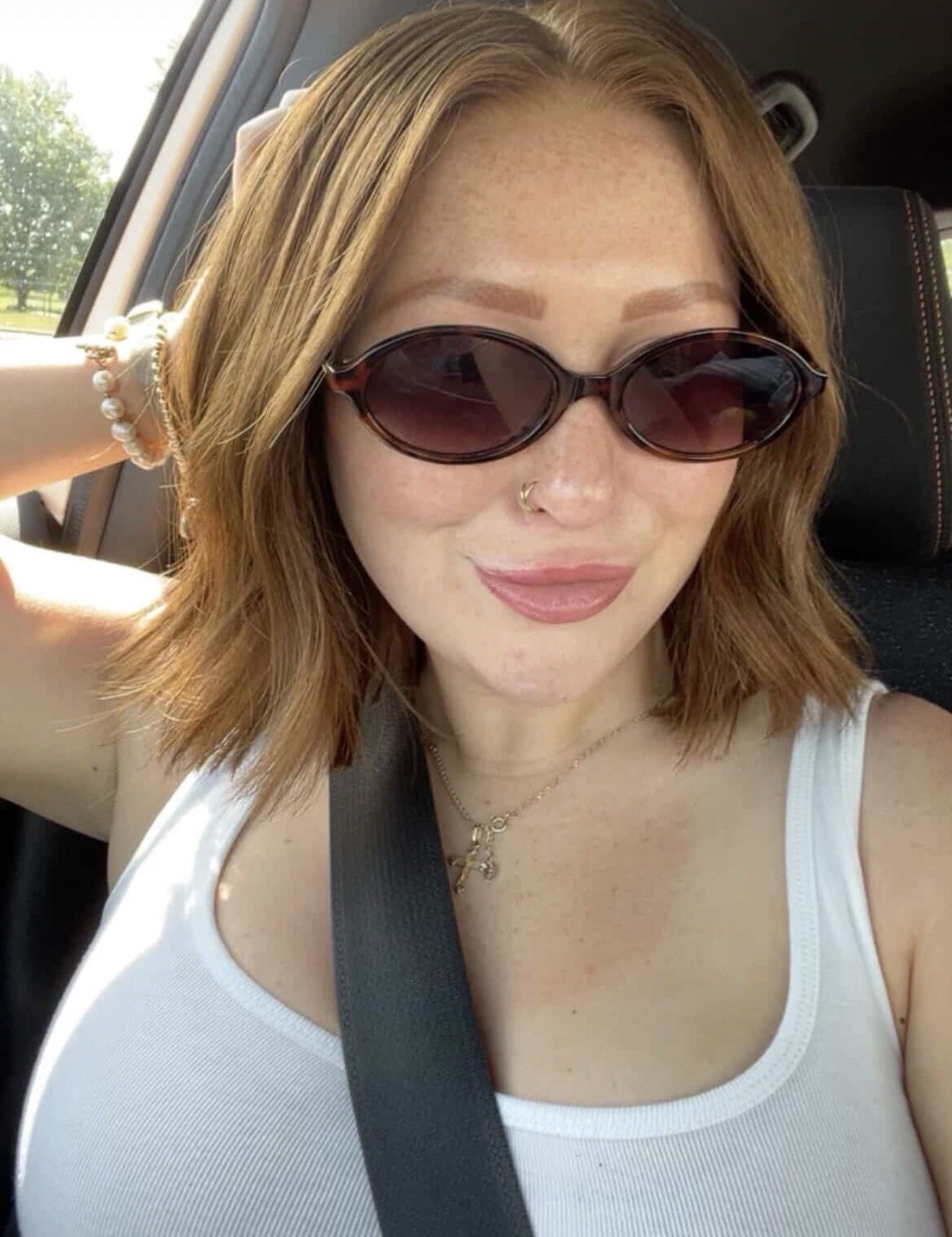 Customer wearing an auburn textured bob wig