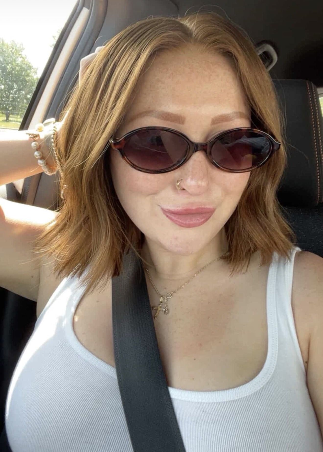 Customer wearing an auburn textured bob wig