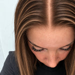 Close-up of the natural lace hairline and parting on a Bronzed Caramel human hair wig