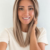 Champagne Melt 16-inch layered straight wig in rooted champagne blonde balayage, front view