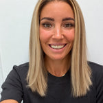 Champagne Melt 16-inch straight wig in rooted champagne blonde balayage, front view