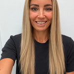 Champagne Melt 22-inch straight wig in rooted champagne blonde balayage, front view