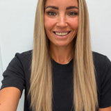 Champagne Melt 22-inch straight wig in rooted champagne blonde balayage, front view