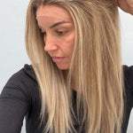 Champagne Melt 22-inch straight wig in rooted champagne blonde balayage, side view showing the hairline