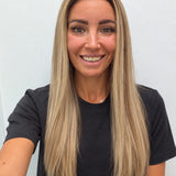 Champagne Melt 24-inch straight wig in rooted champagne blonde balayage, front view