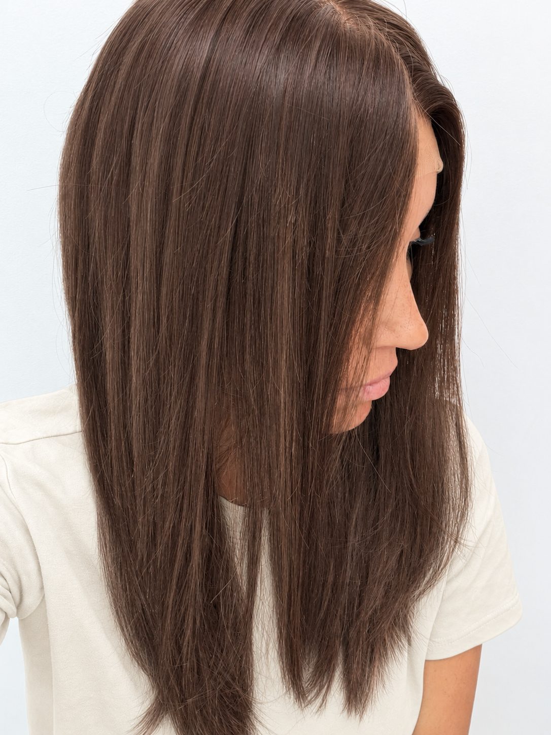 Cocoa 18-inch layered straight wig in rich medium brown, side view showing the hairline