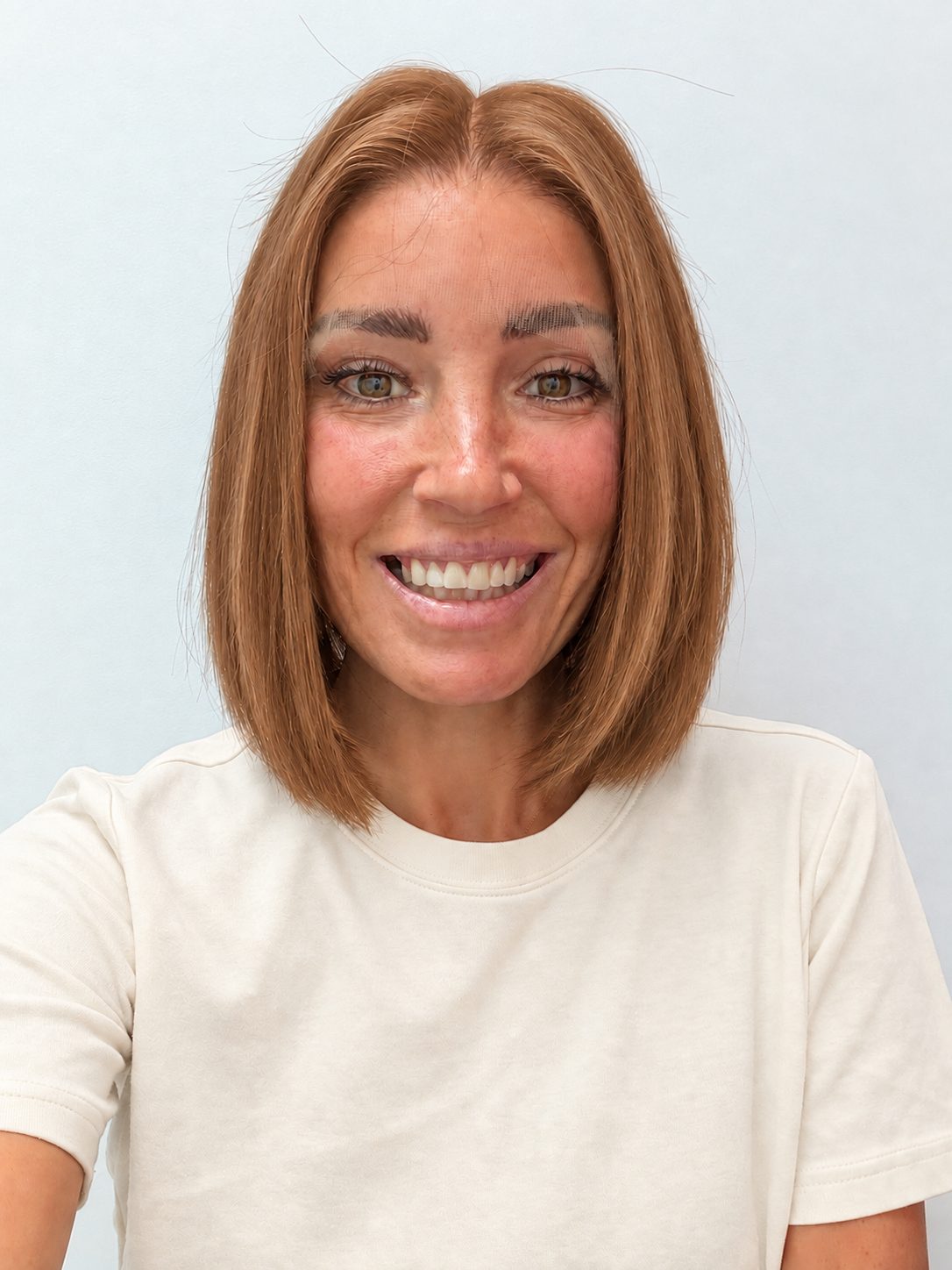 Copper Glow 10-inch blunt bob wig in bright copper red, front view