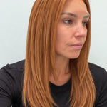 Copper Glow 20-inch straight wig in bright copper red, side view showing the hairline