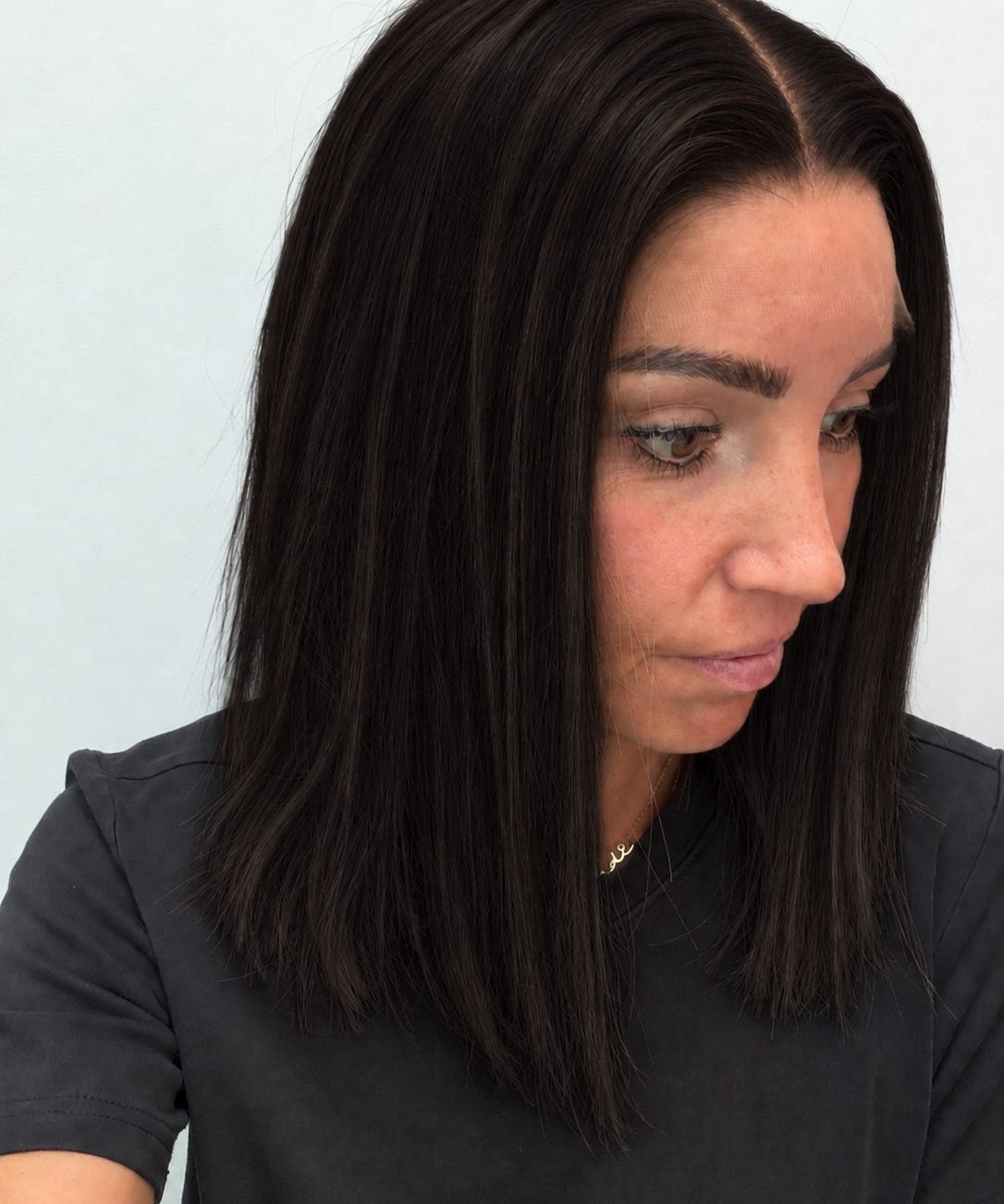 Espresso 14-inch blunt bob wig in dark brown, side view showing the hairline