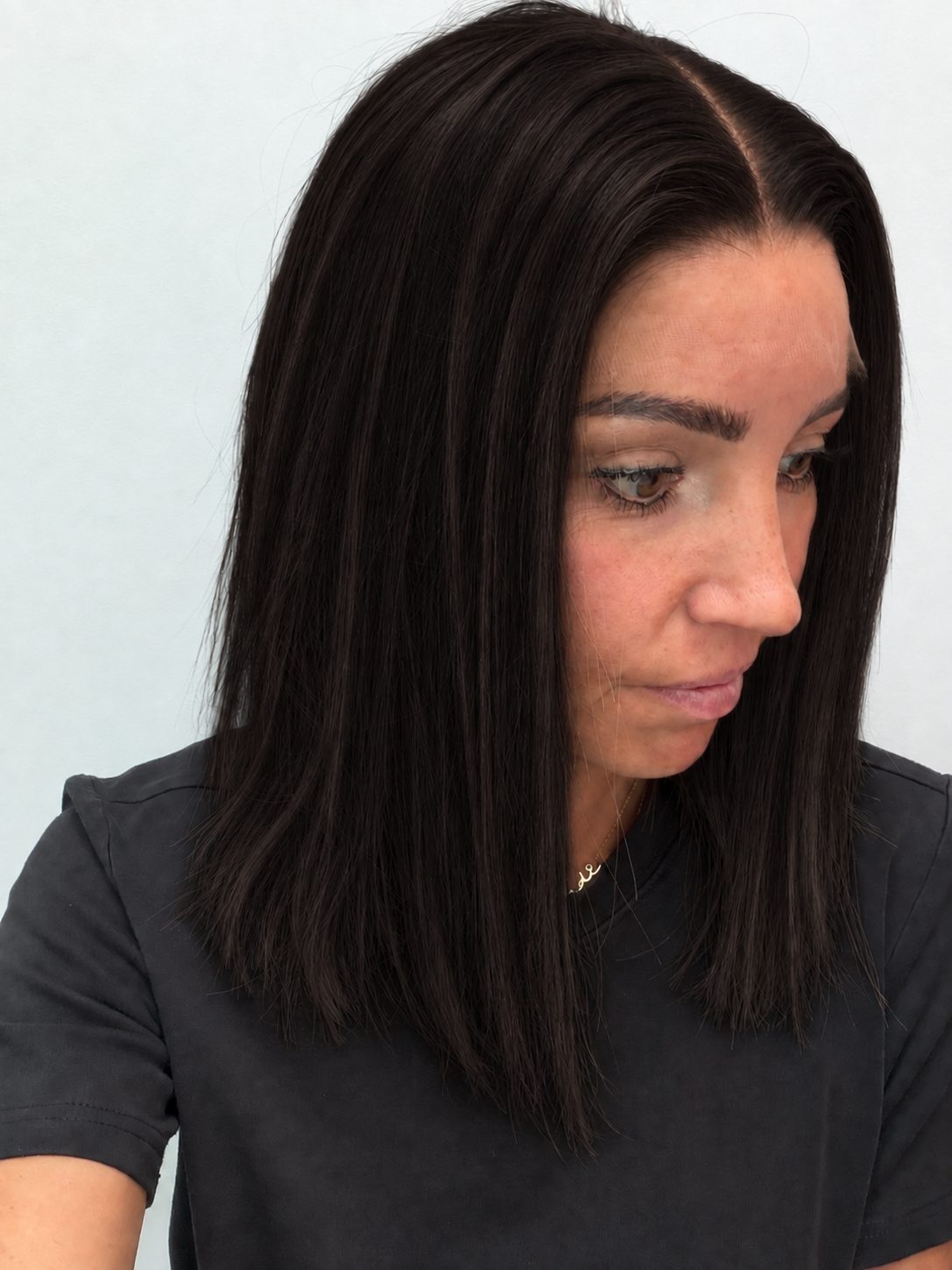 Espresso 14-inch blunt bob wig in dark brown, side view showing the hairline