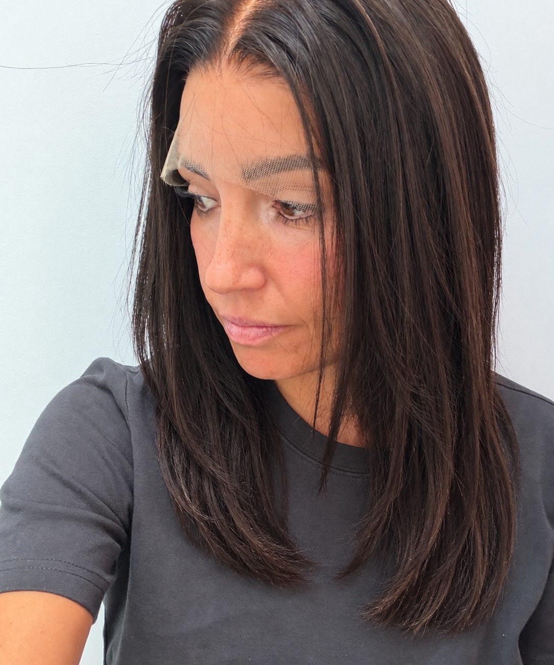 Espresso 14-inch straight wig in dark brown, side view showing the hairline