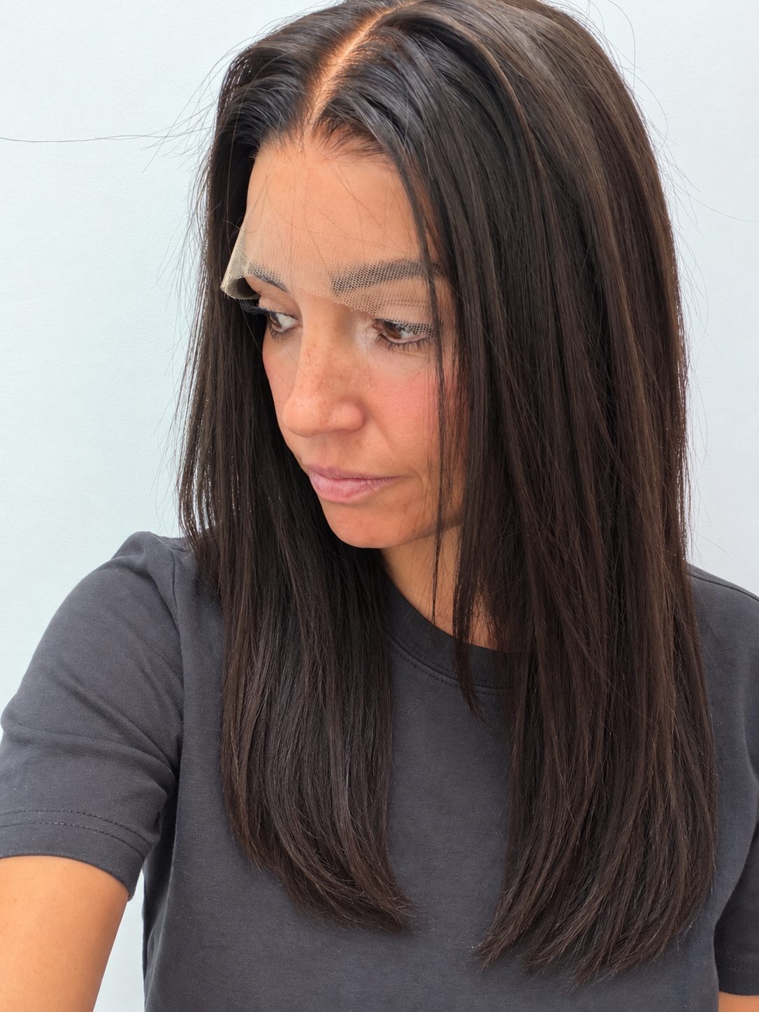 Espresso 20-inch straight wig in dark brown, side view showing the hairline