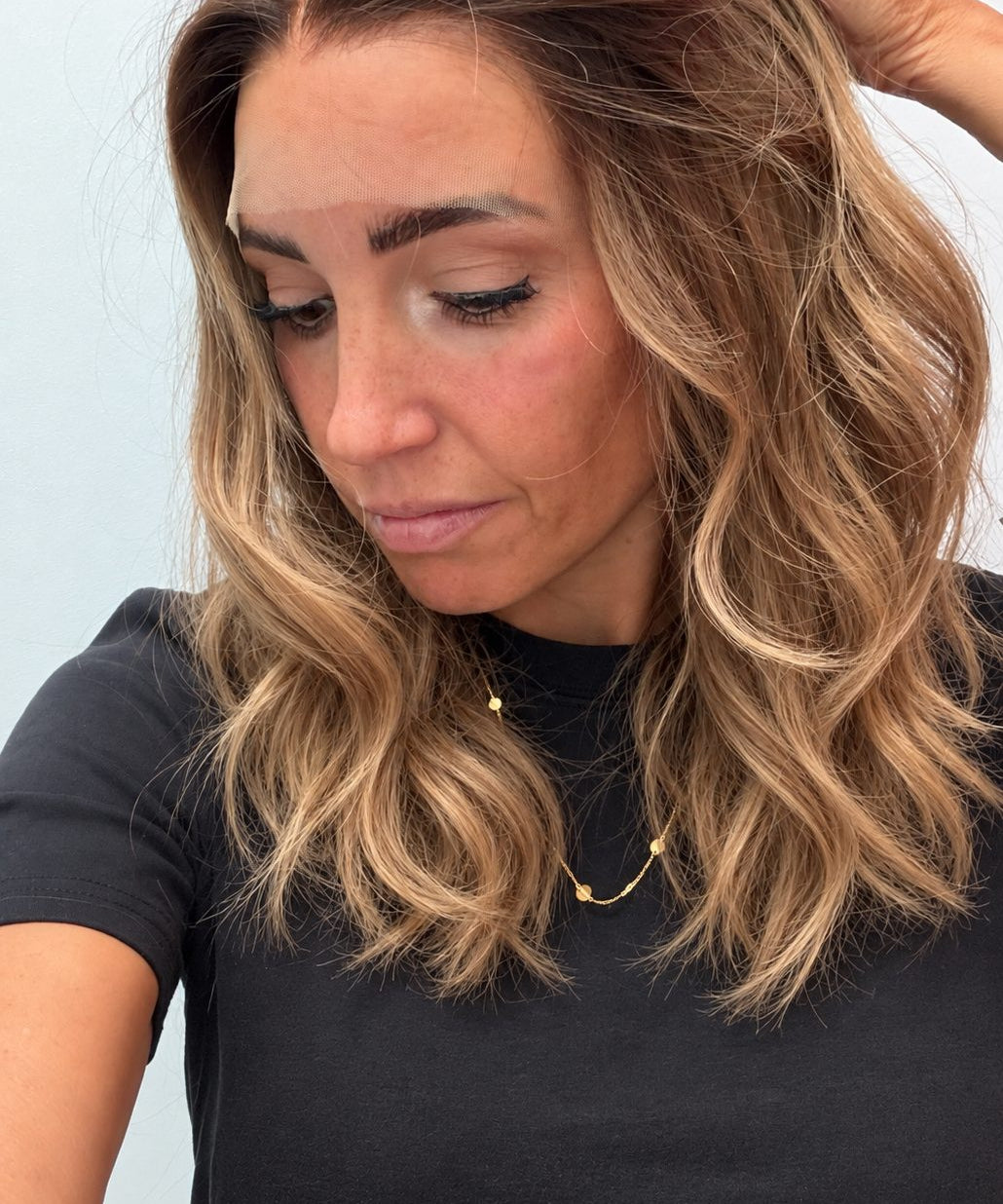 Golden Honey 14-inch wavy wig in golden blonde balayage, side view showing the hairline