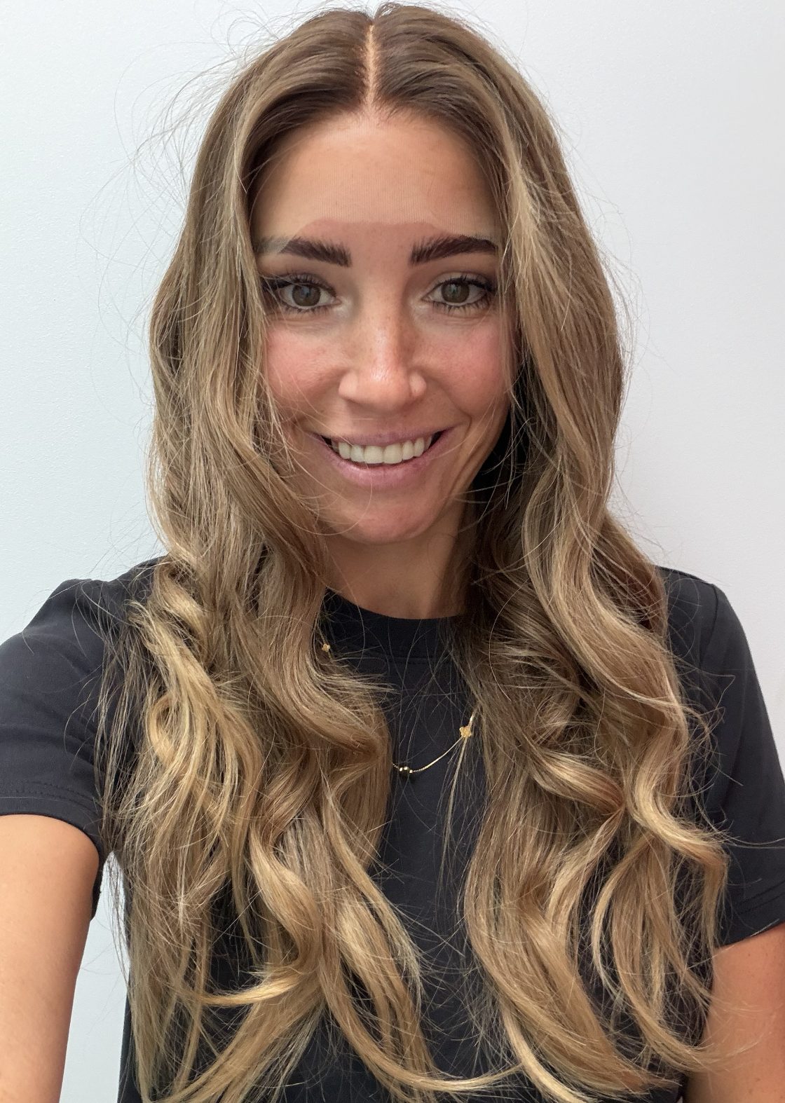 Golden Honey 24-inch wavy wig in golden blonde balayage, front view