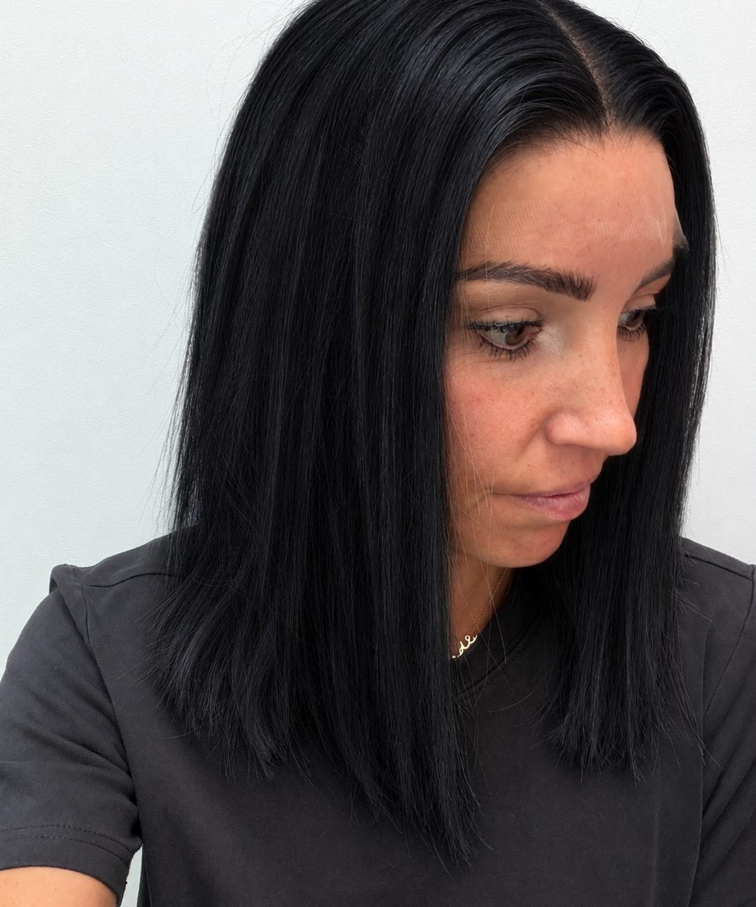 Midnight 14-inch blunt bob wig in jet black, side view showing the hairline