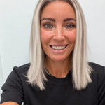 Nordic Pearl 14-inch blunt bob wig in rooted platinum blonde, front view