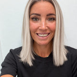 Nordic Pearl 14-inch blunt bob wig in rooted platinum blonde, front view