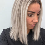 Nordic Pearl 14-inch blunt bob wig in rooted platinum blonde, side view showing the hairline