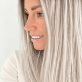 Nordic Pearl 16-inch layered straight wig in rooted platinum blonde, side view showing the hairline