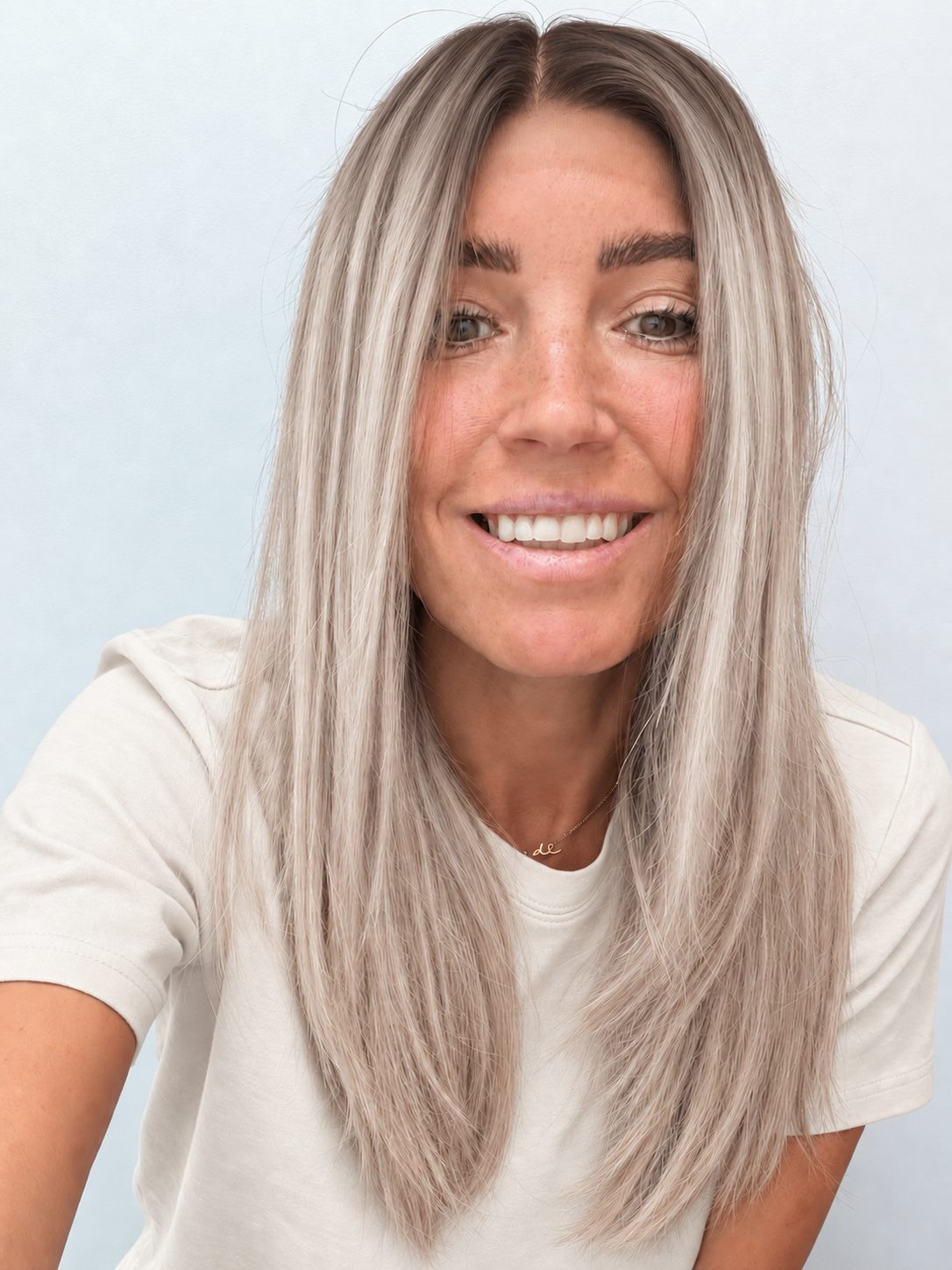 Nordic Pearl 18-inch layered straight wig in rooted platinum blonde, front view