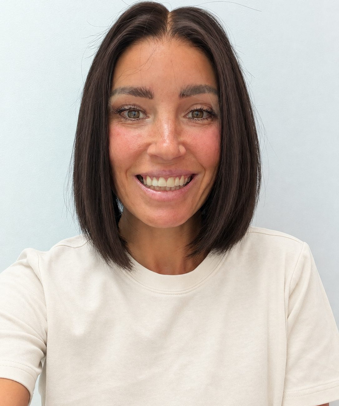 Soft Onyx 10-inch blunt bob wig in soft natural black, front view