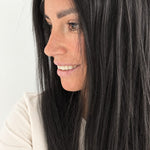 Soft Onyx 16-inch layered straight wig in soft natural black, side view showing the hairline