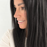Soft Onyx 16-inch layered straight wig in soft natural black, side view showing the hairline