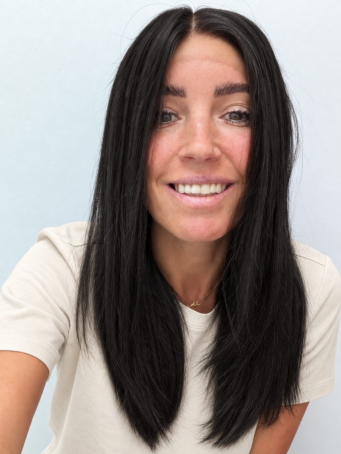 Soft Onyx 18-inch layered straight wig in soft natural black, front view