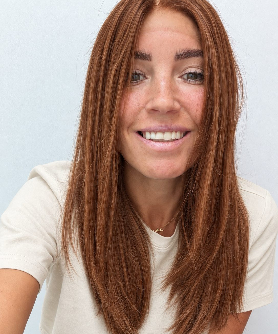 Spiced Auburn 18-inch layered straight wig in warm auburn red, front view