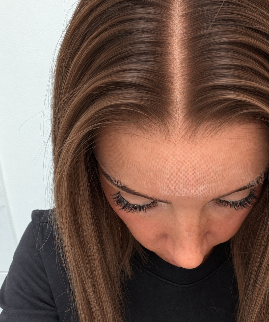 Close-up of the natural lace hairline and parting on a Spiced Red Caramel Balayage human hair wig