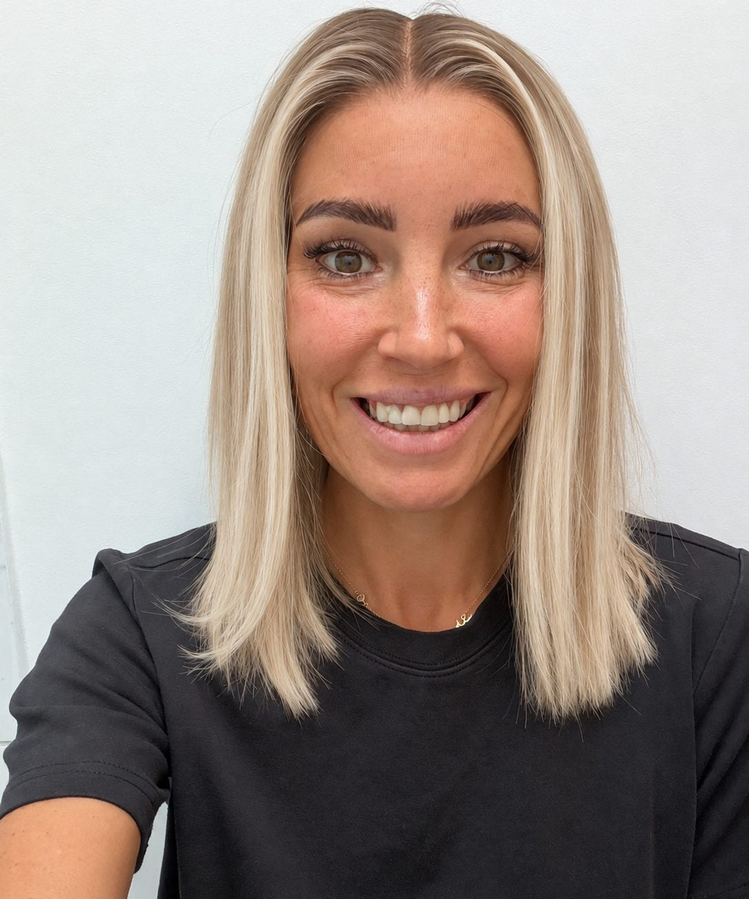 Vanilla Sand 14-inch blunt bob wig in rooted beige blonde, front view